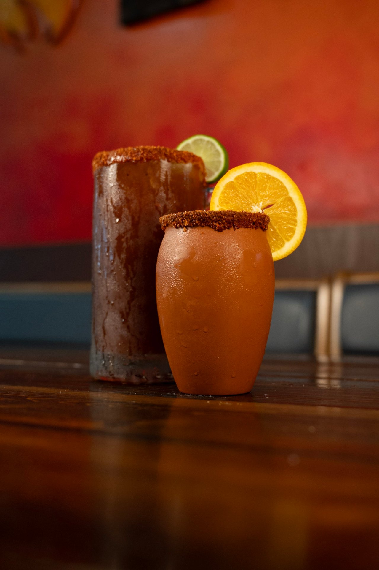 Michelada and cantarito on the bar